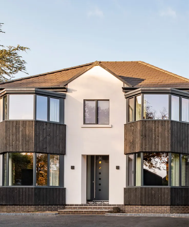 Modern home with grey aluminium casement windows
